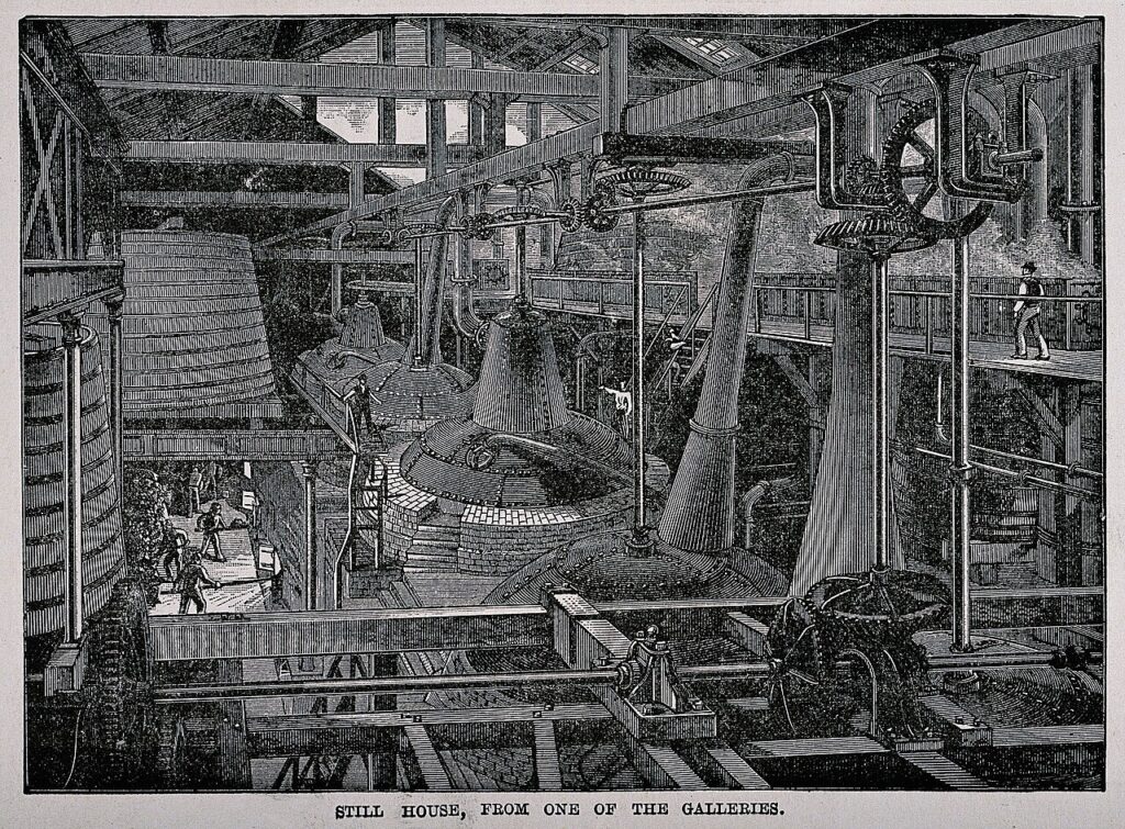 A still house in a whiskey distillery - Wood engraving, late 19th century - Wellcome V0019351.jpg